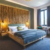 Boutique Hotel LANDHAUSZEIT, отель в городе Бад-Мюнстерайфель
