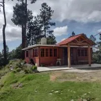 Viesnīca Cabaña la Escondida pilsētā Cruz de Madroño