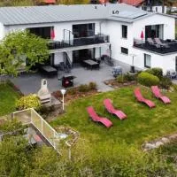 Ferienwohnung 5 mit Ostseeblick am Breitling โรงแรมในMalchow