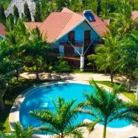 Pearl Homes, готель у місті Укунда