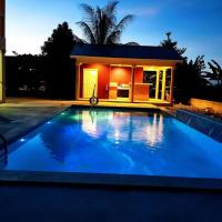 Casa de Bells 1, Hotel in der Nähe vom Owen Roberts International Airport - GCM, Prospect Park