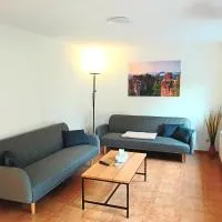 Seyfarthrooms - Ferienwohnung Zum Dorfladen Rathen - zentrale Lage mit direkter Anbindung an das Wanderwegenetz, moderne Inneneinrichtung، فندق في راثين