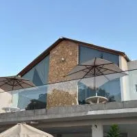 Villa Suíça, Chalé Mezanino، فندق في تيانغوا