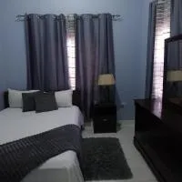 Cool & Cozy Retreat in Jacar Homes: Spanish Town şehrinde bir otel