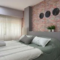 Departamento Vivir la música, hotel i Campana