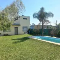DPTO con PARQUE, PARRILLA y PISCINA a minutos del centro, hotel v destinaci Concepción del Uruguay