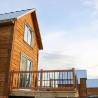 Éco-Chalets Monk, מלון בTourville