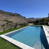 Casa rural con baño adaptado y piscina en Mogán, hotel i Mogán