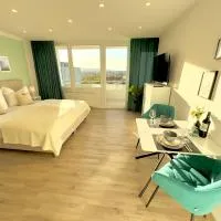 M&D Apartments nähe Stadion mit Klimaanlage - Netflix - Küche - Sunset View - Balkon, hotel i Kaiserslautern