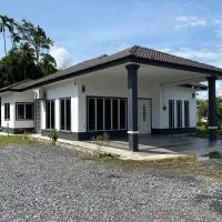 De'Orchard 748، فندق في Kampong Batu Ampat Sanglang