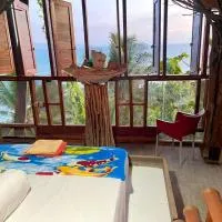 Karang Aji Beach Villa, hôtel à Cisolok