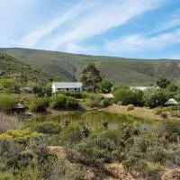 Watermill Farm Cottages، فندق في Van Wyksdorp