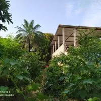 Chez Yaya - Chambre Double "Bleue", Calme & Nature, hotell i Oussouye