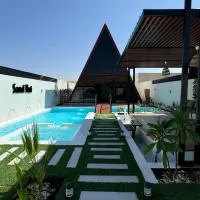 sandhut77 โรงแรมในAl Raka
