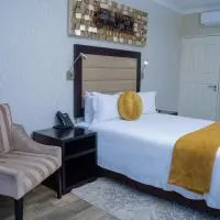 Q's Boutique Stay، فندق في Standerton