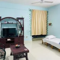 Best Homestay, hotel en Puttaparti