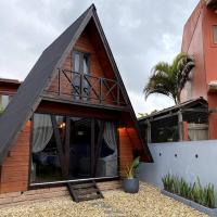 Cabana Beira-Mar na Praia da Ferrugem Unidade Riviera, hotell i Garopaba