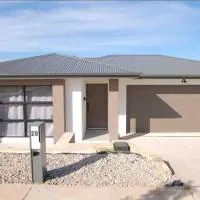 Brand New Delight Home at Throsby with 4 Bedrooms，Harrison的飯店