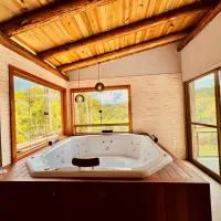 Rancho do Lagarto Pedra Azul - JACUZZI E ÁREA GOURMET, מלון בדומינגוס מרטינס
