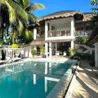 Sirom Beach House โรงแรมในTambobong