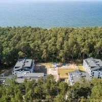 K&K Apartment - Premium z basenem - SeaShell - Easy - Rent Apartments, hotelli kohteessa Łukęcin
