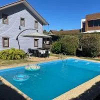 Cabaña con tinaja - piscina privada - estufa - cerca de playa, hotel u gradu Dichato