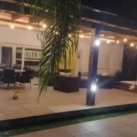 Casa Condomínio Ocean Side Torres, отель в городе Торрис