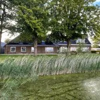 Tussen Wad en Dijk - Vakantieappartement, viešbutis mieste Sint Jacobiparochie