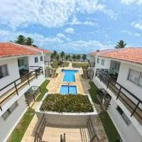 Apartamento Pé na areia no condomínio Manga Verde, hotell i Itamaracá