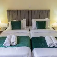 Riverside Haven 4BR Modern Home with Private Serene Compound, hotel sa Kericho