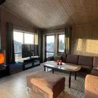 Hjertebo by Norgesbooking - cabin at Spåtind, хотел в Nord Torpa