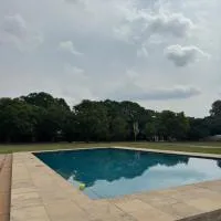 Hartbeespoort में, होटल CMK Lodge