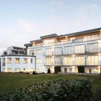 Hotel Vier Jahreszeiten an der Therme & Kliniken Bad Krozingen Nähe Freiburg & Schwarzwald Ideal für Wellness Kur & Business Ausflüge 24h Check In- WLAN & Parken gratis, hotel en Bad Krozingen