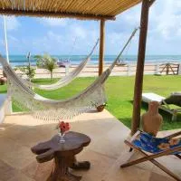 Vila Carnaúba - casa pé na areia em Guajiru Trairi، فندق في غاجيرو