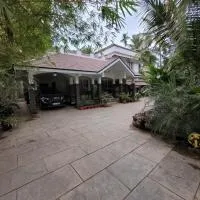 Akalapuzha Homestay، فندق في كوجيكود
