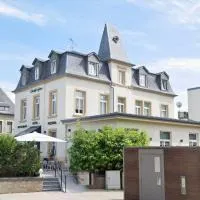 Charly's Gare, hotel en Senningerberg