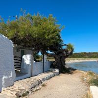 Una casa sulla spiaggia, Hotel in Es Grau