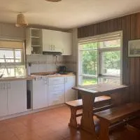 Departamento tranquilo y equipado en parcela privada, cerca de comercios, khách sạn ở Puerto Montt