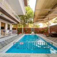 Treebo Grand Royale Eco Residency with Pool, hotel a Cavelossim