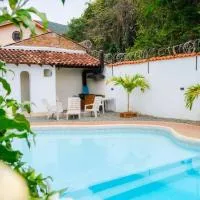 Magiko Suites, hotel v mestu Roldanillo