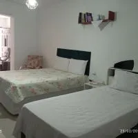 Casa próxima ao Forum, отель в городе Позу-Алегри