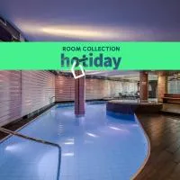 HOTIDAY Room Collection - Campiglio Pradalago, hotel in Madonna di Campiglio