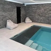 Le loft avec jacuzzi privatif - Domaine aux charmes d'Ethan - Piscine en option, hotel a Hannut