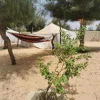 Les jardins fleuris de lompoul sur mer, Hotel in Tioukougne Peul