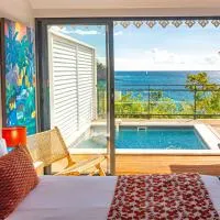 LES GALETS ROUGES LODGES & SPA, hotell i Bouillante