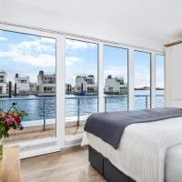 5 Beaufort - Wasserhaus, Meerblick, Sauna, Dachterrasse, Bootsanleger, Strandkorb, hotell i Olpenitz