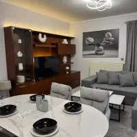 Mnēmes Apartment, hotel i Néoi Epivátai
