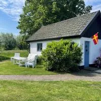 Gästhus i lummig trädgård - i idylliska Örum, hotel a Löderup