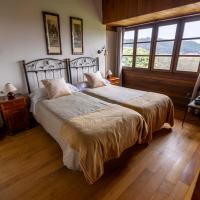 Complejo Rural Las Mimosas del Nalon, hotel dicht bij: Luchthaven Asturias - OVD, La Arena