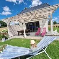 Domek Kaszubski Chill z balią ogrodową, hotel v destinaci Łąkie